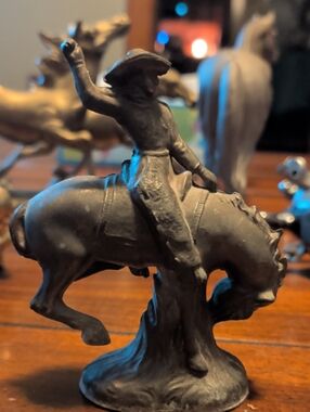 Rustic Cowboy on Horse Figurine - Black Decorative Sculpture